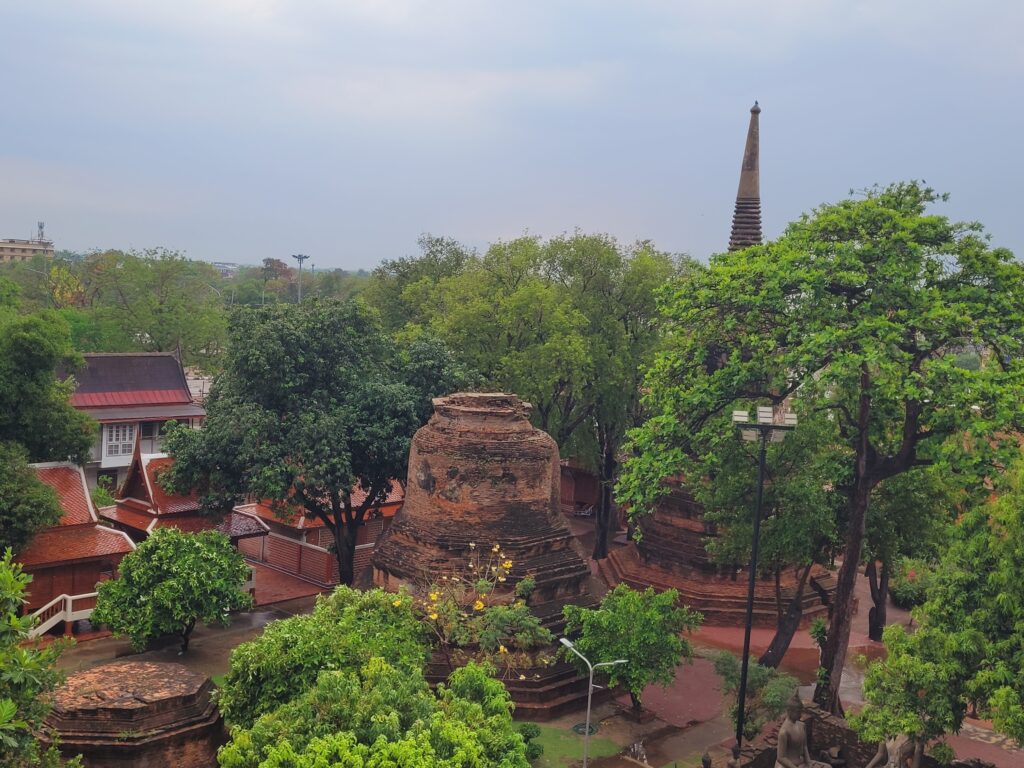 Traditional Thai temple with golden Buddha statues